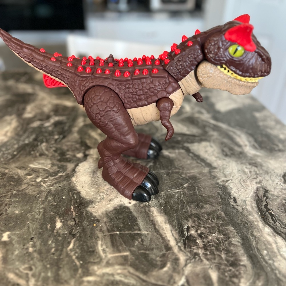 Imaginext Jurassic World Carnotaurus Dinosaur Toy with Spike Strike Action